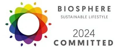 Colorful petal circle with 'Biosphere Sustainable Lifestyle 2024 Committed' text.